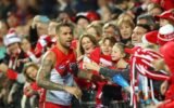 Carlton fans find joy and belonging in AFL fandom