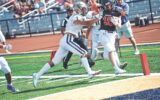 Manhasset Football Star Leads Team to Unbeaten Season