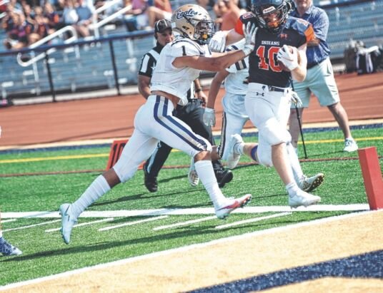 Manhasset Football Star Leads Team to Unbeaten Season