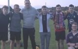 scottish amateur football team smiling after losing 51-0