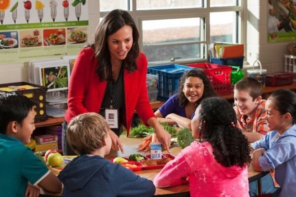 teacher receiving award in classroom