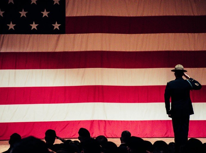 U.S. veteran with American flag