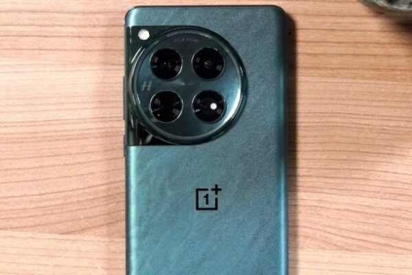 OnePlus 13 in Arctic Dawn color with its camera