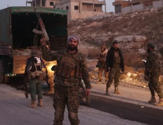 Syria rebels in Aleppo 2024