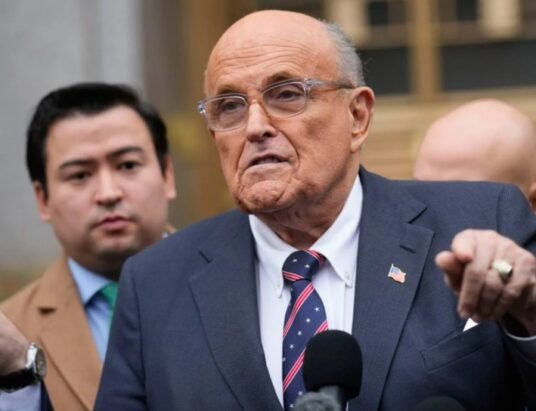 Rudy Giuliani leaving Manhattan court