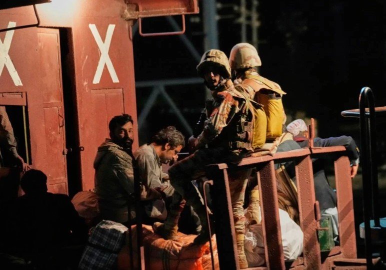 Pakistani soldiers rescue train
