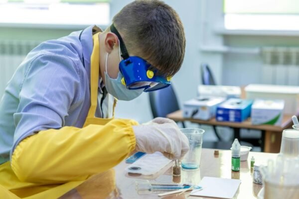 student researcher in science lab