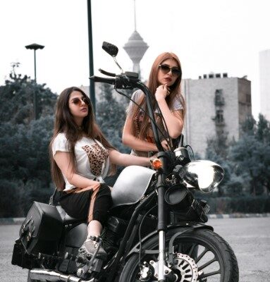 women motorcyclists riding together