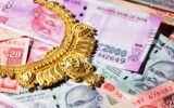 Indian rupee currency notes and gold