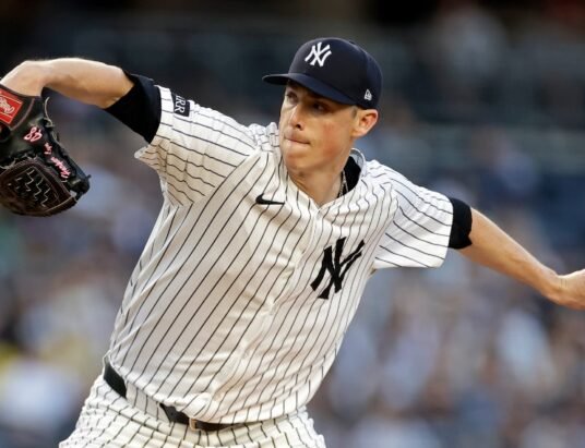 Carlos Carrasco pitching for New York Yankees