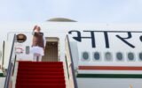 Narendra Modi boarding aircraft