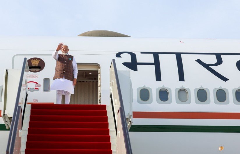 Narendra Modi boarding aircraft