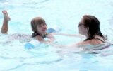 children swimming safely