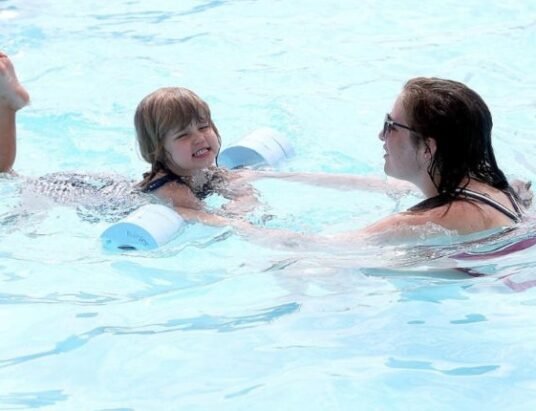 children swimming safely
