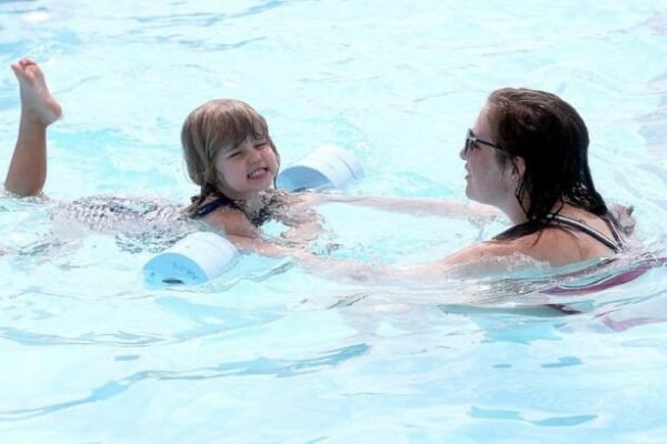 children swimming safely