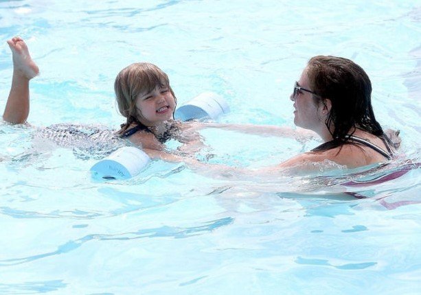 children swimming safely