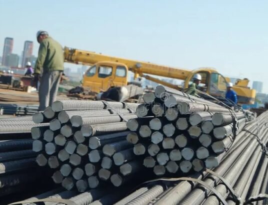 workers loading steel products at Chinese
