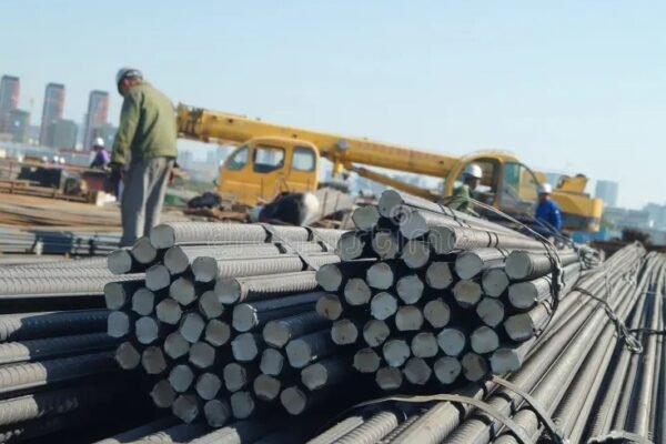 workers loading steel products at Chinese
