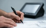 Georgia State Election Board approves hand-marked ballot resolution before July QR code deadline.