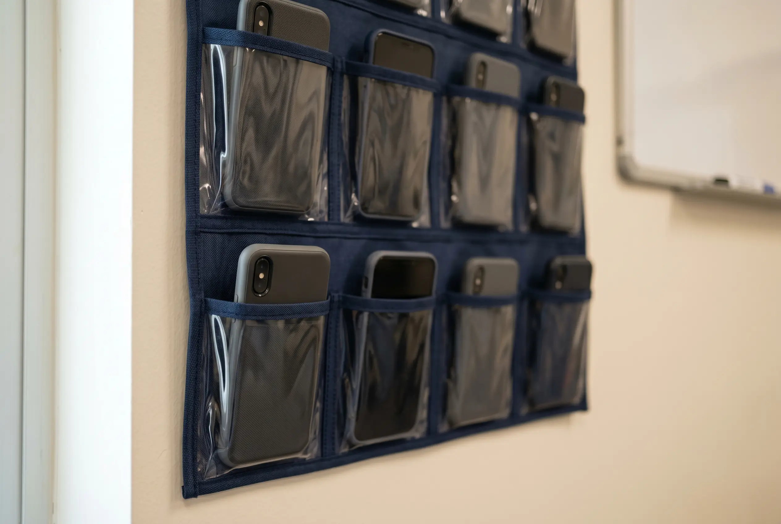 Georgian schools required to install classroom phone storage under new education rules.
