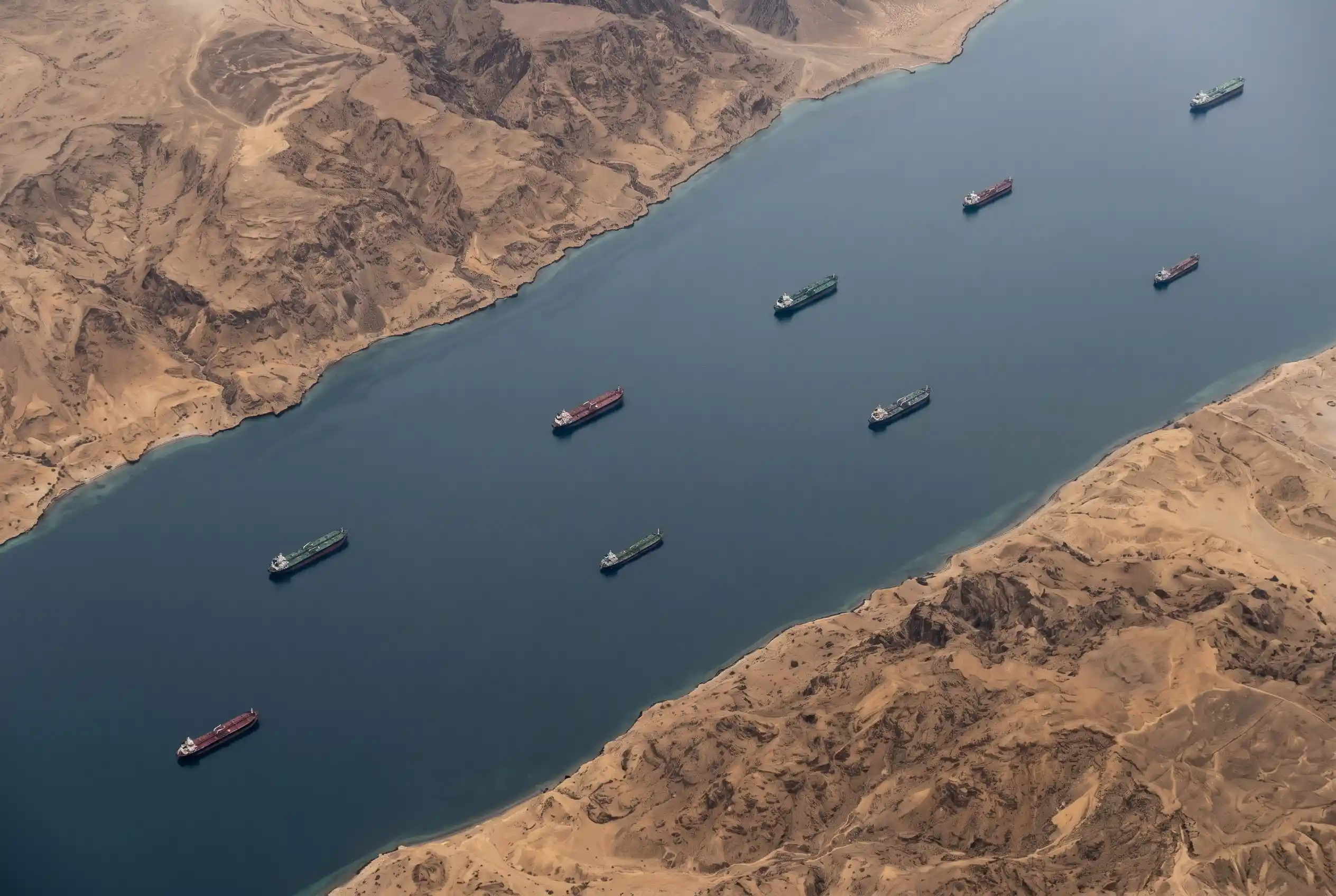 Strait of Hormuz double blockade oil crisis 2026 tanker war historical comparison.