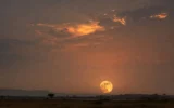 Strawberry Moon low over Telangana horizon at dusk