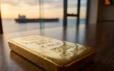 gold silver prices Fed rate decision Kevin Warsh Iran tensions
