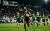 Junior Springboks winger diving to score a hat-trick try