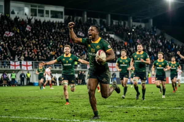 Junior Springboks winger diving to score a hat-trick try